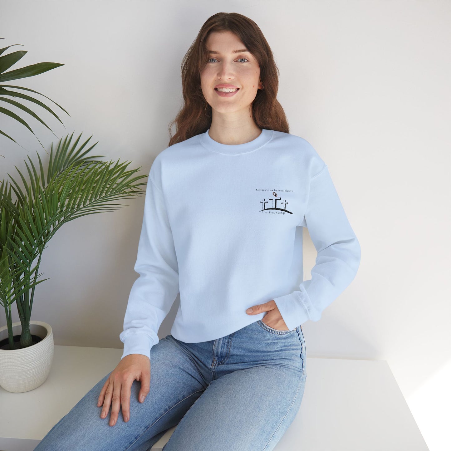 Cozy Unisex Sweatshirt with embroidered Christus Victor Logo
